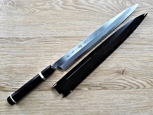 Show details for Akazawa Togashi Ao-ichi-Ko Hongasumi Yanagi 300mm Free upgrade Gokujyou Ebony Saya Cover ( Semi handmade )(Market price $138)+Ebony Handle With Two Silver Rings Picture of Akazawa Togashi Ao-ichi-Ko Hongasumi Yanagi 300mm Free upgrade Gokujyou Ebony Saya Cover ( Semi handmade )(Market price $138)+Ebony Handle With Two Silver Rings